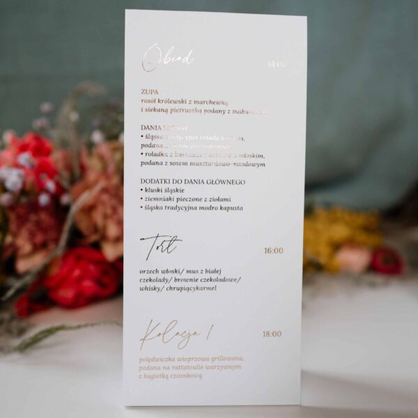 Eleganckie menu stojące w kolorze białym z złotą czcionką