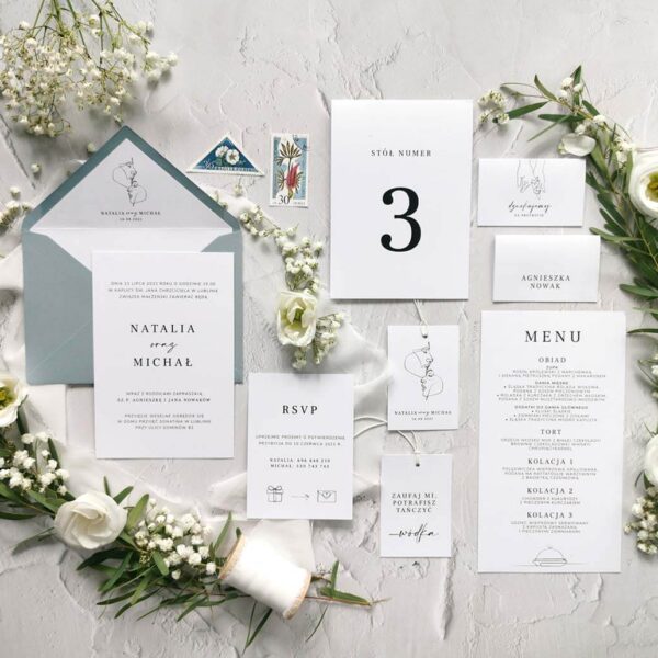 Oryginalna papeteria z delikatnymi wzorami i niebieską kopertą