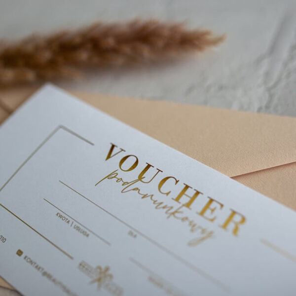 Voucher podarunkowy z ręcznym złoceniem.