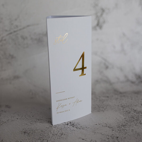 Złocone menu weselne