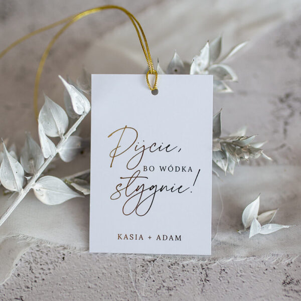 Złote zawieszki na alkohol