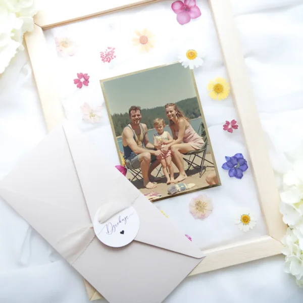 Podziękowania dla rodziców ze zdjęciem w ramce ozdobionej kwiatkami
